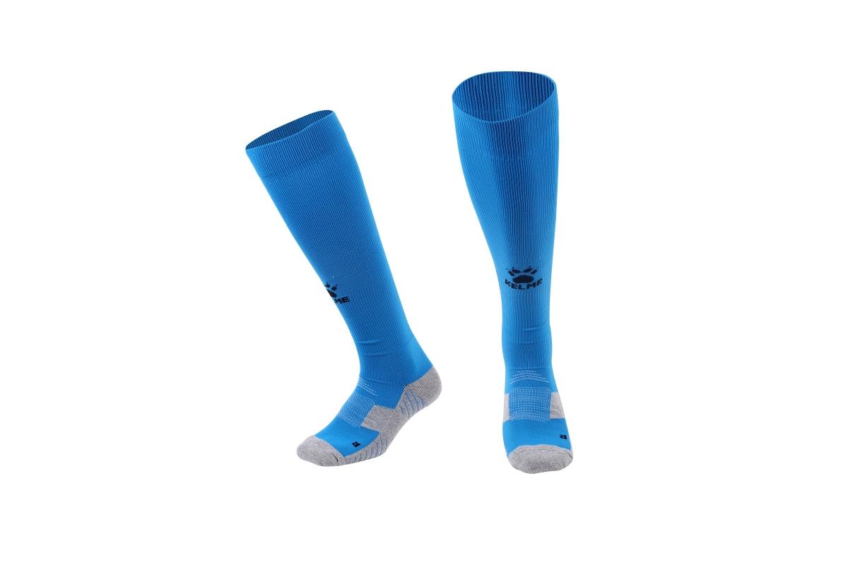 Pair of blue knee-high socks with a logo on a white background